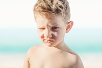 Sunscreen on face of child.