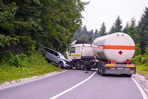Tanker truck accident with car.