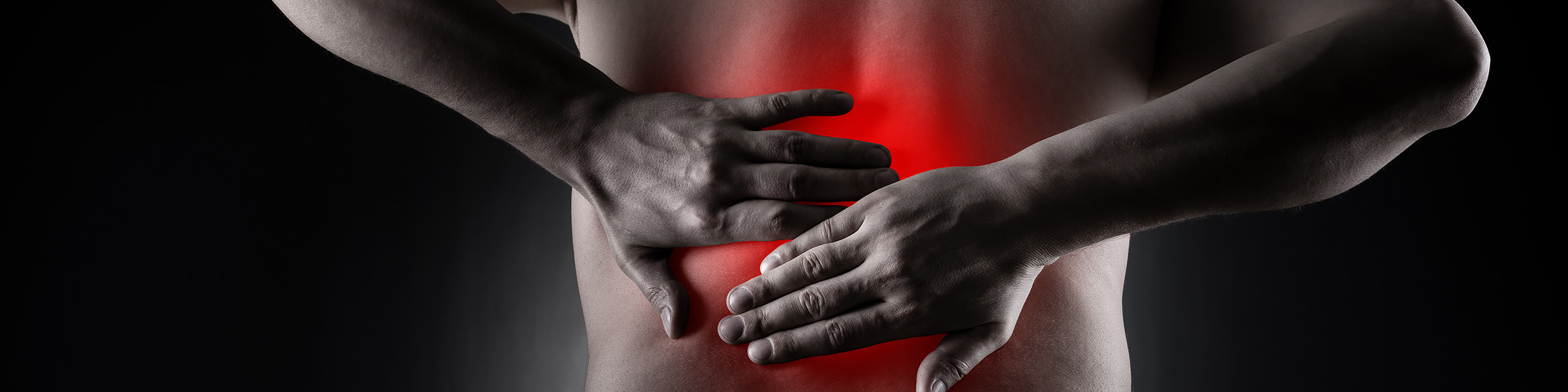 rendition of man's back with redish area indicating area of severe pain.