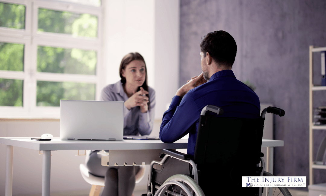 paralysis-injury--lawyer-talking-with-man-in-wheel-chair