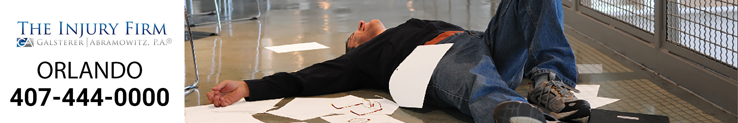 Man lying on floor after a slip and fall accident.