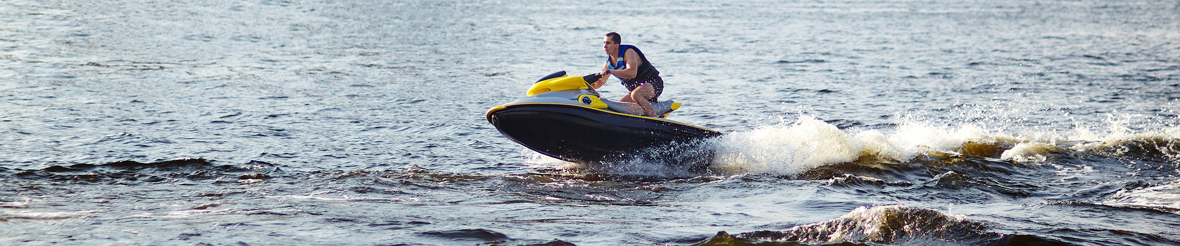 jet ski in ocean near beach.