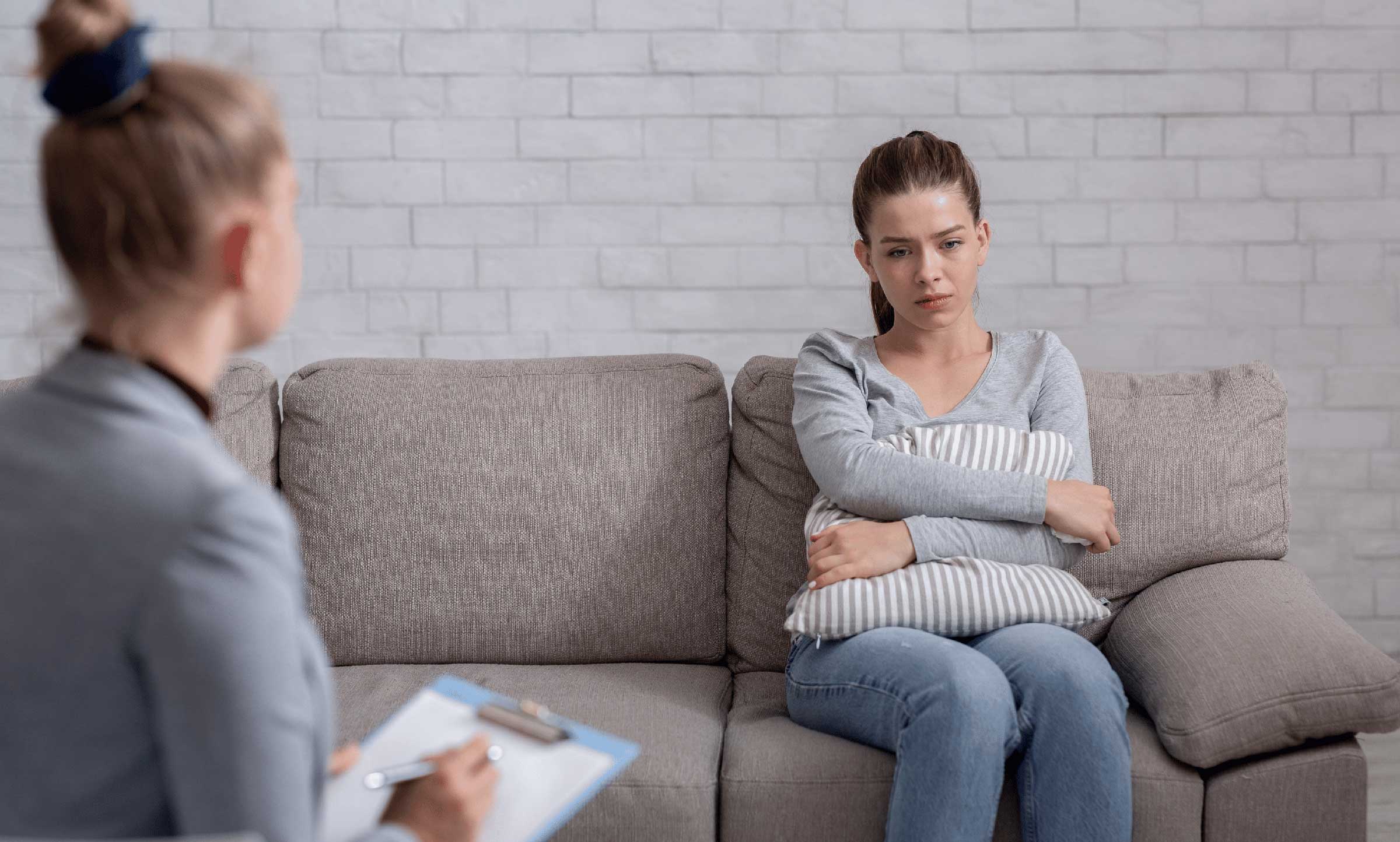 ptsd victim talking with ptsd lawyer V2