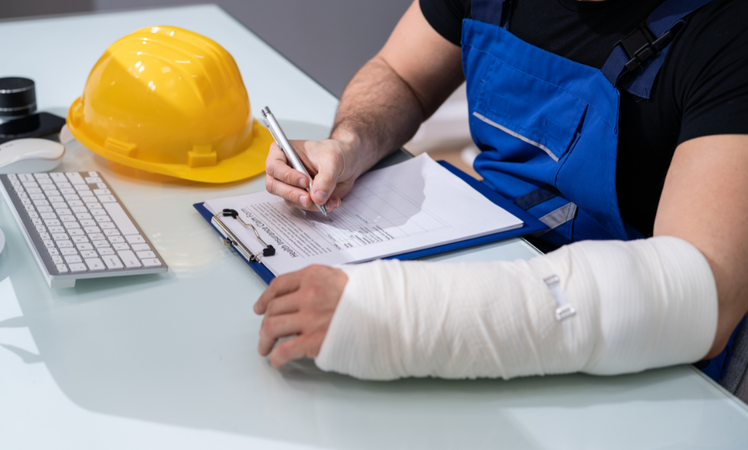 injured worker filing workers comp paperwork