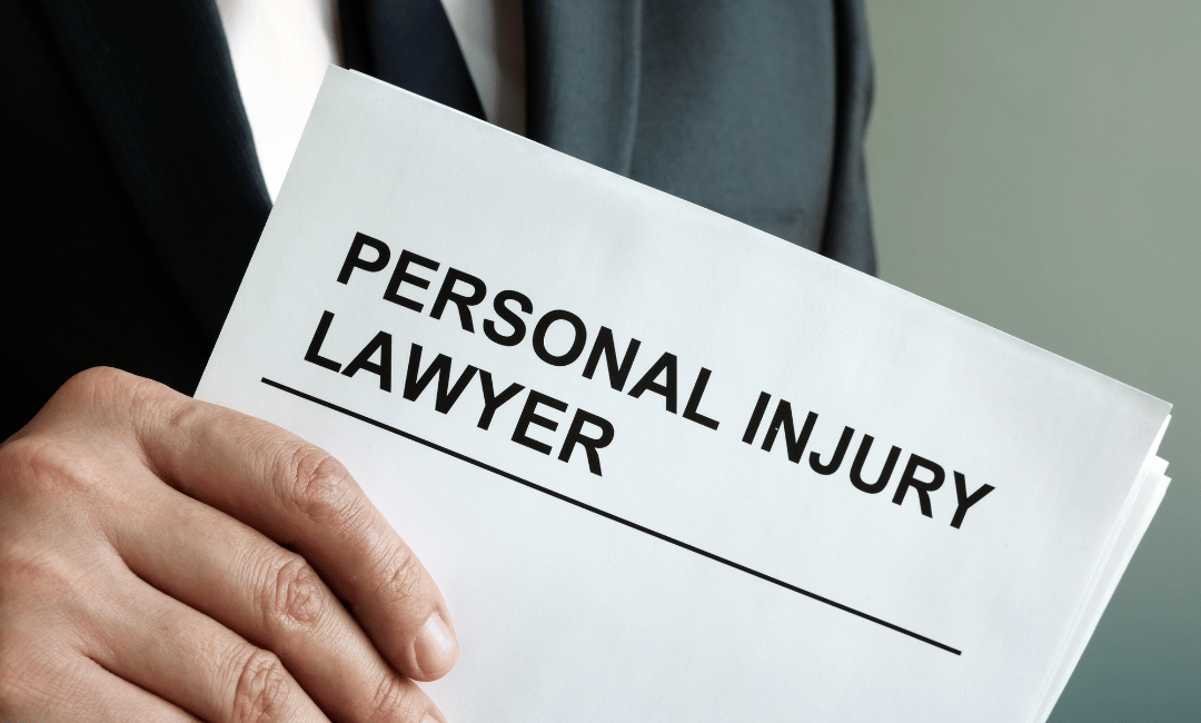 personal injury lawery folder in hand of lawyer
