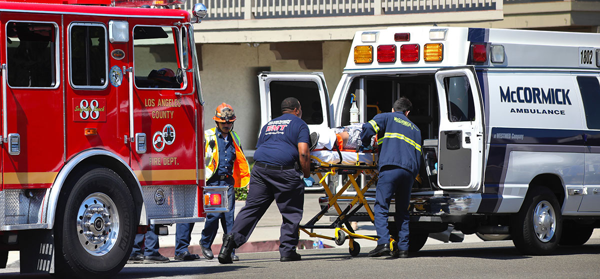 car accident victim transported to hospital by ambulance