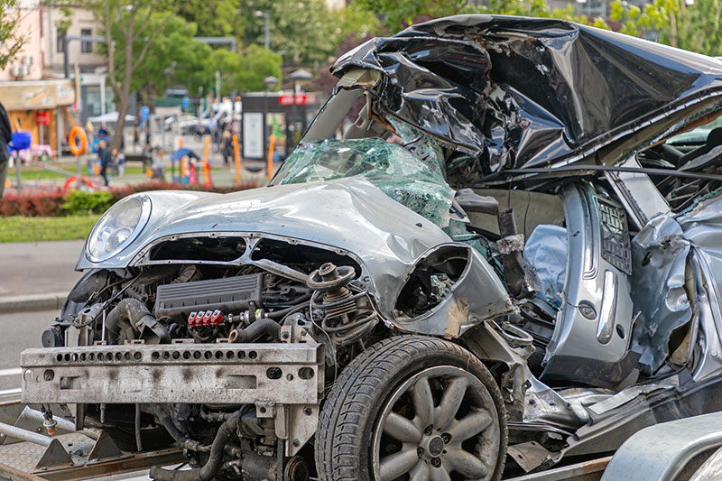 crushed small car fatal car accident