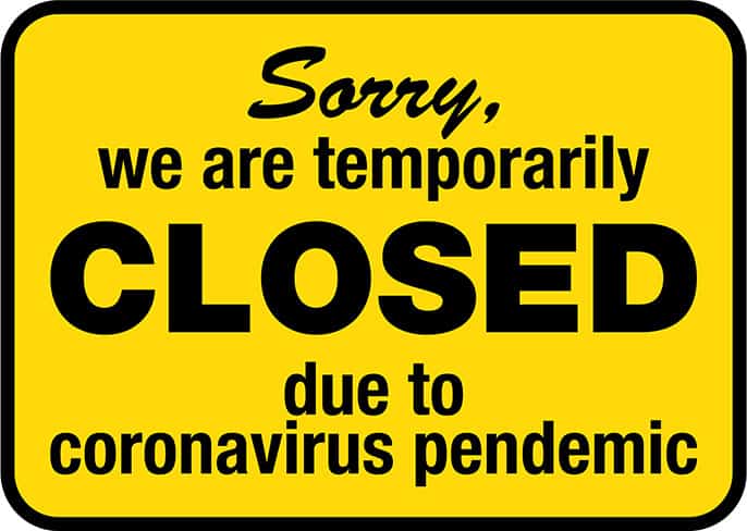 image - yellow sign we are temporarily closed due to coronavirus pandemic