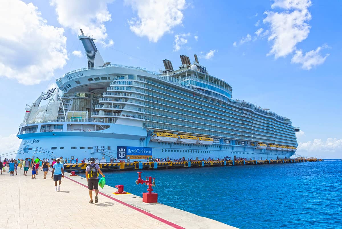 image - huge cruise ship docked with passengers embarking at Cozumel mexico