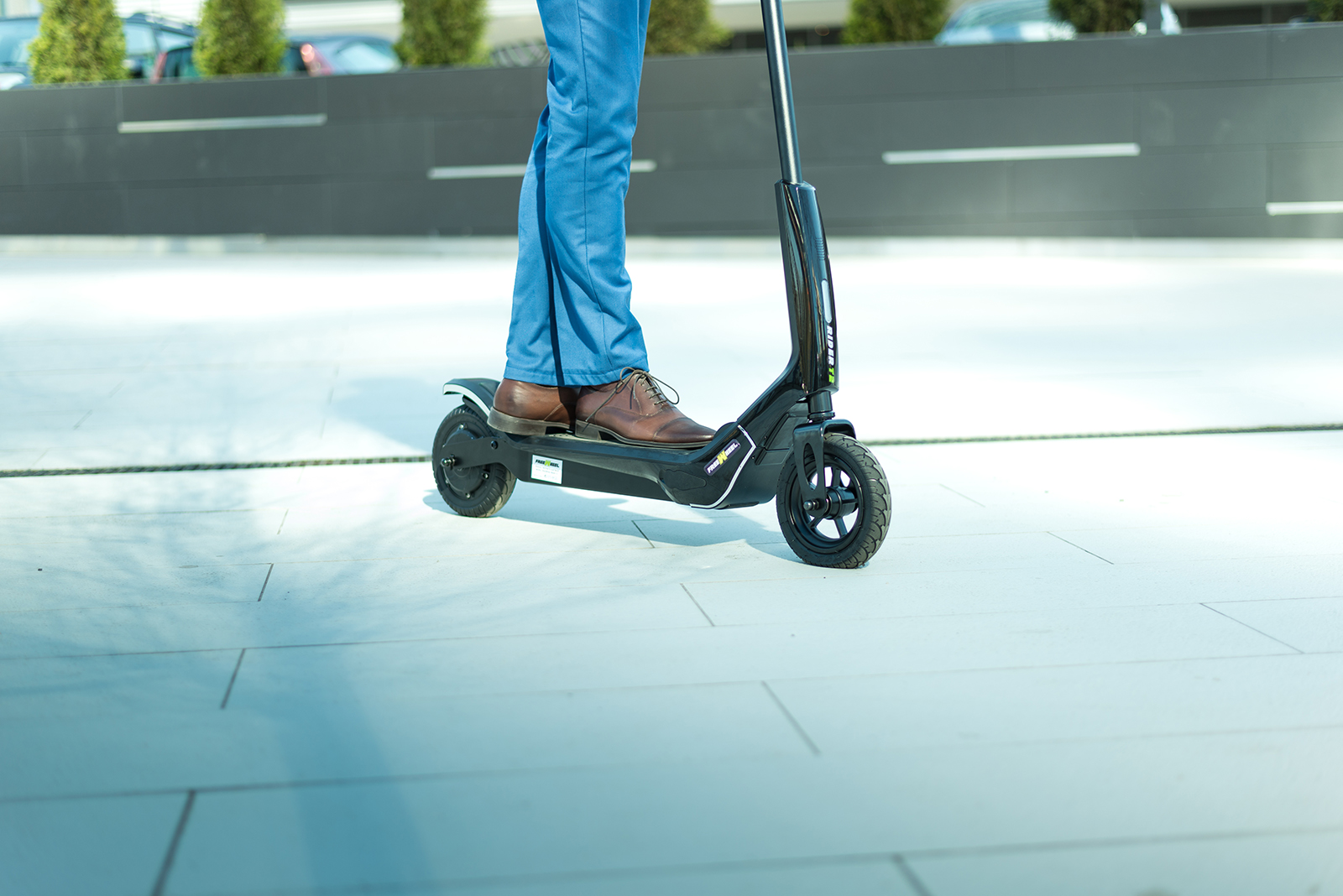 Using electric scooter on the streets
