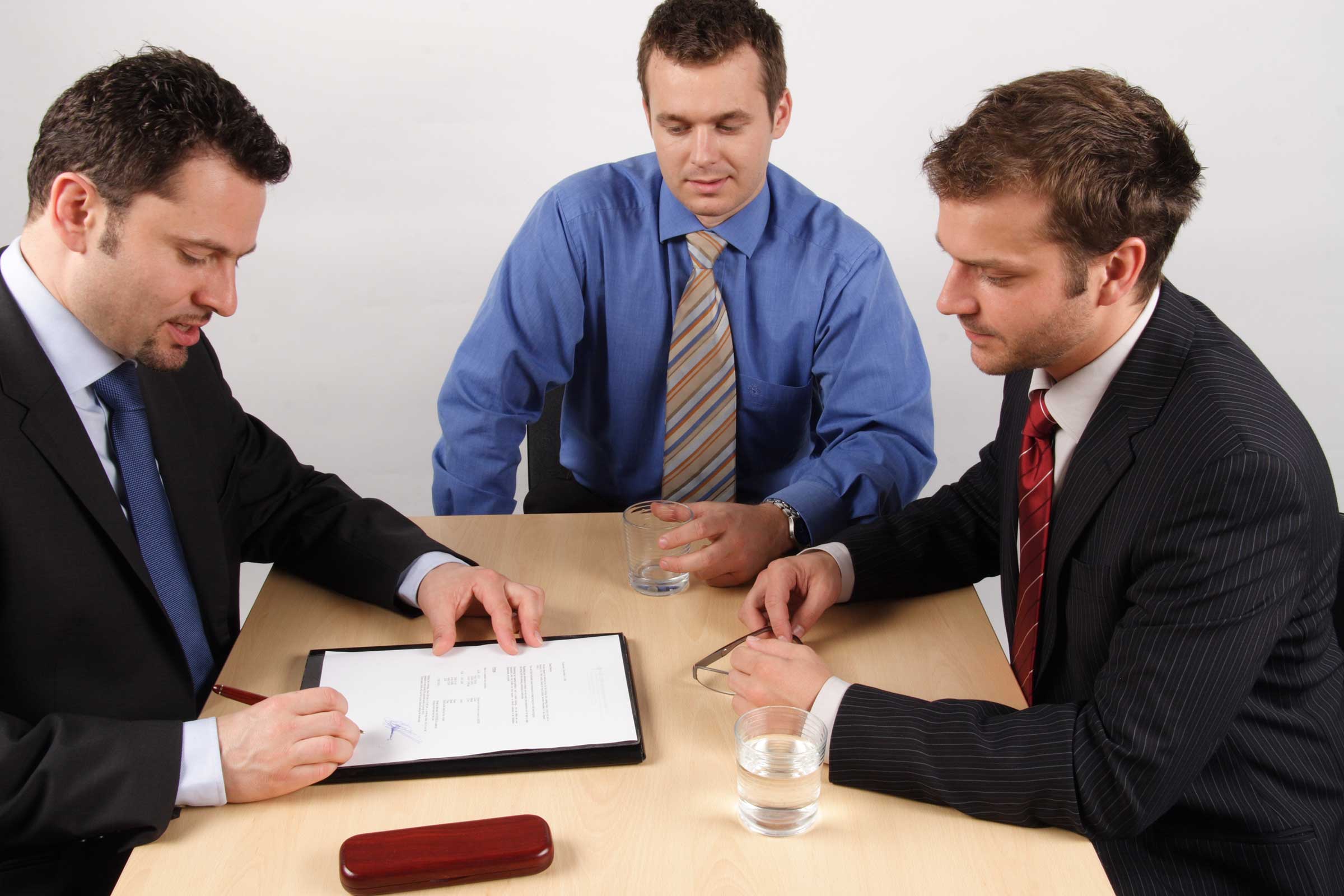group of west palm beach lawyers discussing injury case