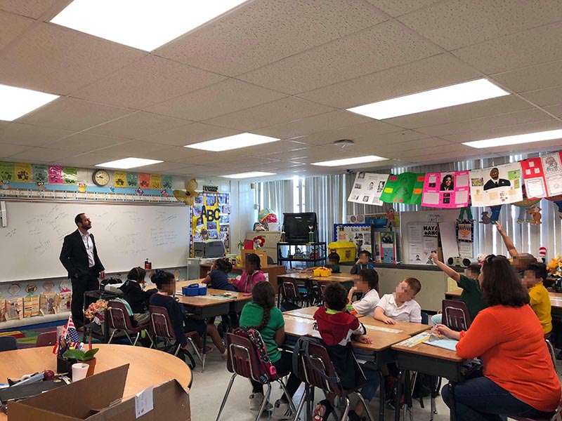 oakridgeo elementary school children with faces pixelated for security puposes while given a lesson by Ron Abramowitz