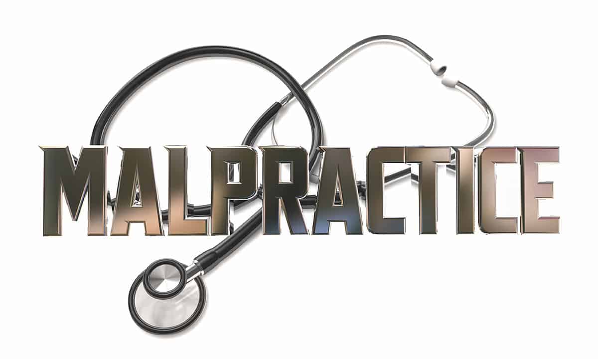 Medical malpractice words with stethoscope