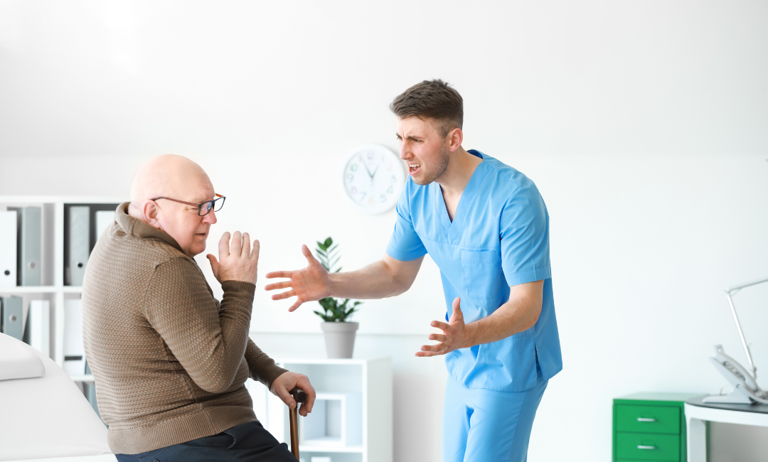 lawyers/images/nursing-homes/orlando-nursing-home-abuse-psychologically.png Show thumbnail preview A nurse in blue scrubs appears to be angrily confronting an elderly man with glasses and a cane, who looks frightened and is recoiling on a medical examination table in a bright office.