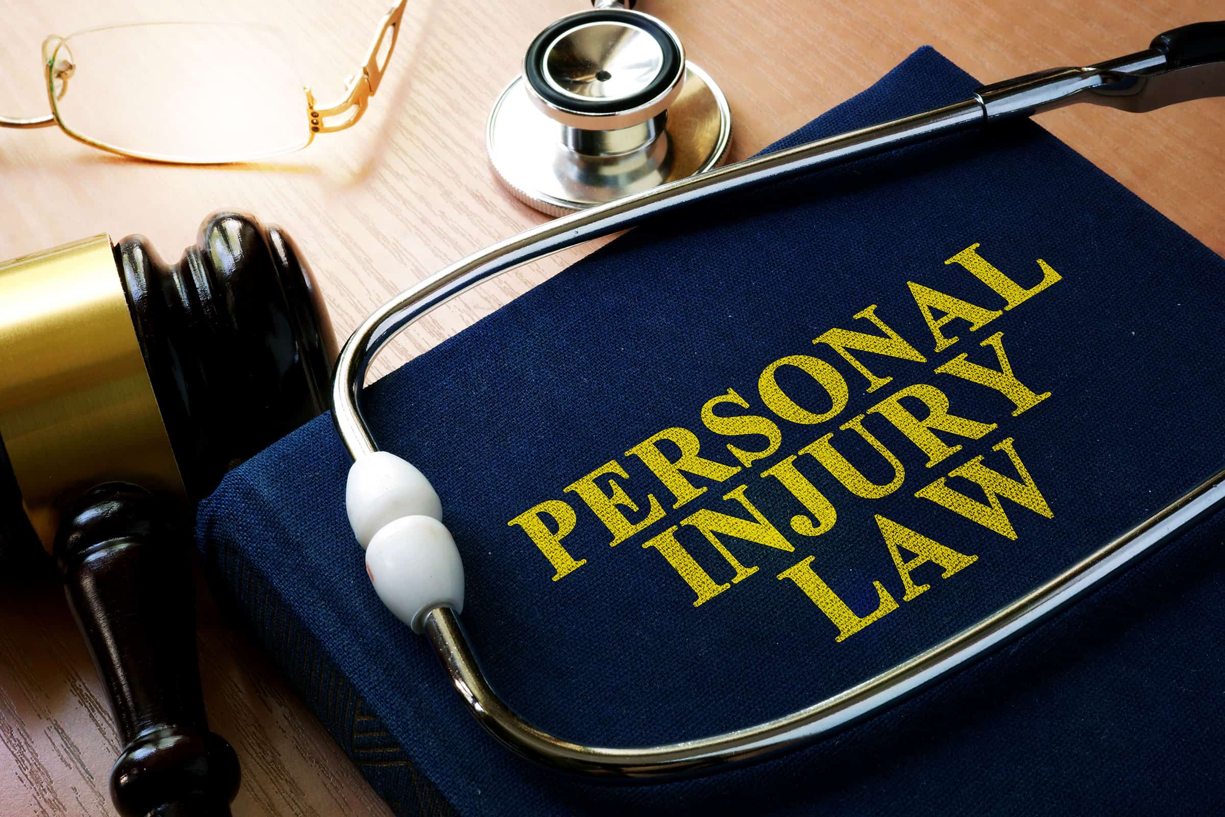 personal injury law book stethoscope