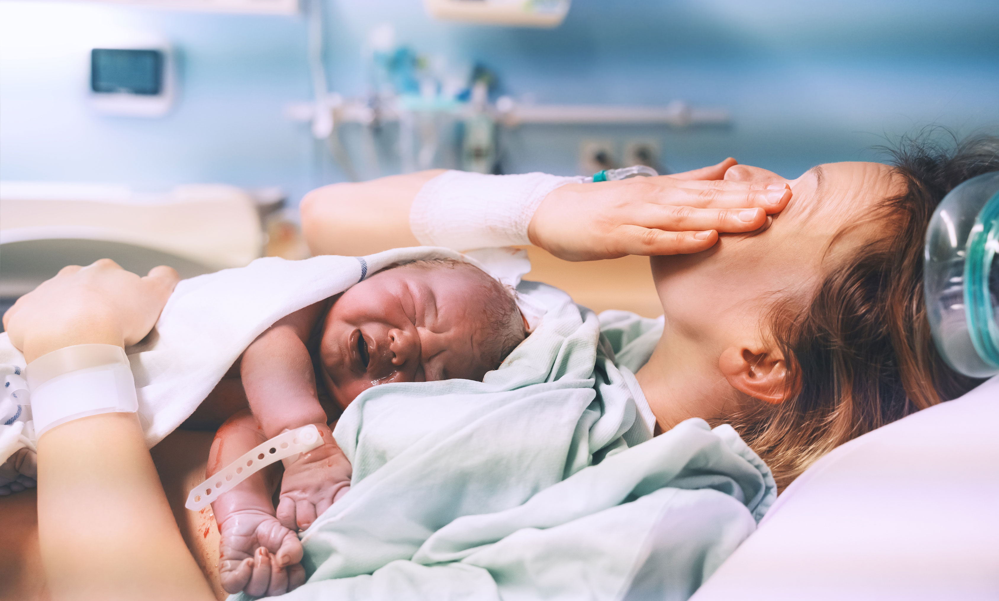 HIE Birth Injury baby and mother in hospital bed