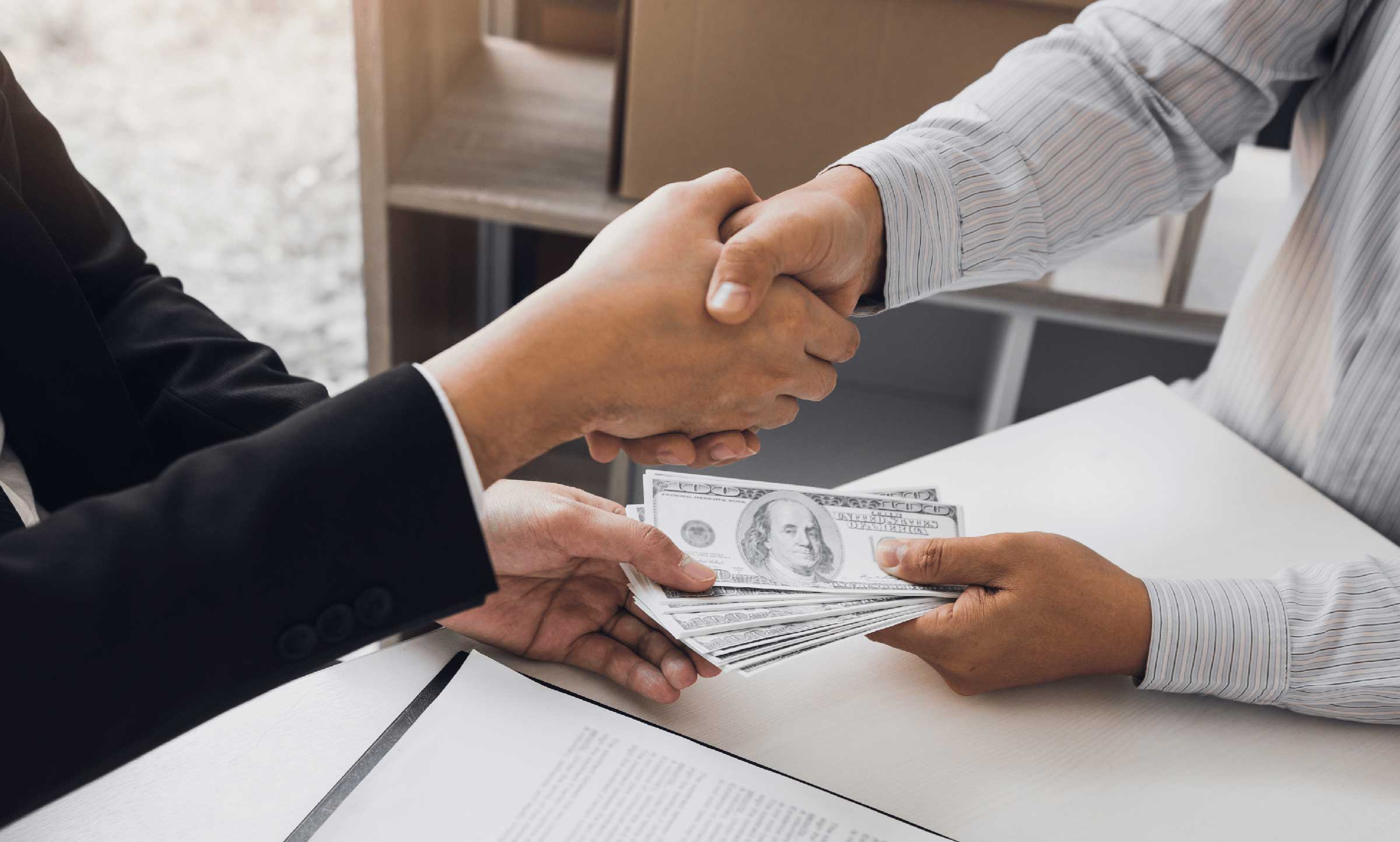lawyer paying client the settlement in cash