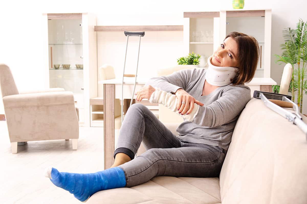 Woman-suffering-injuries-on-couch-after-Atlanta-car-accident