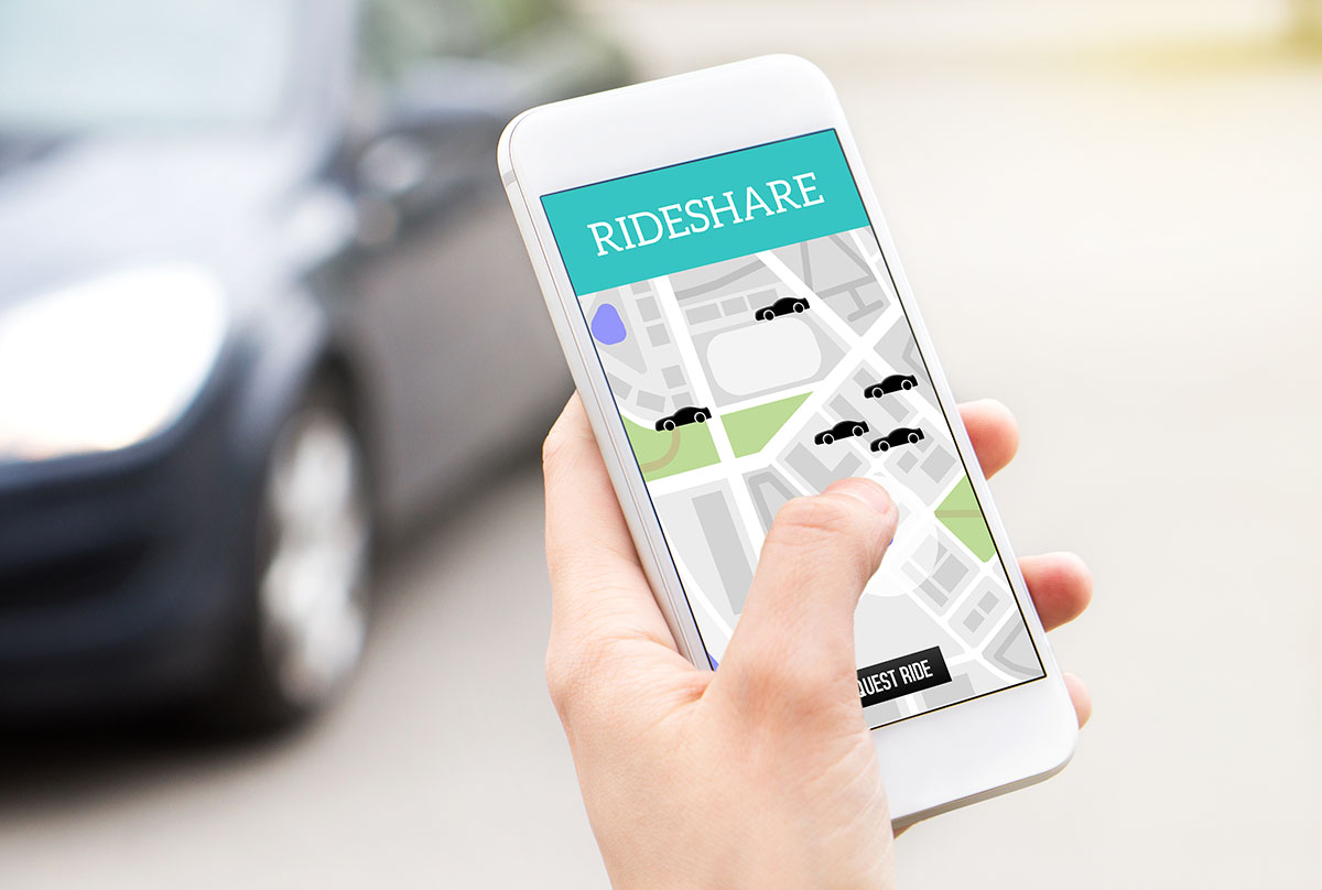 Ride share taxi service app on cell phone