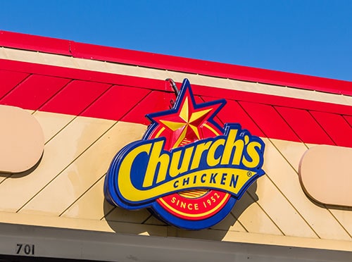 churchs chicken restaurant outdoor sign on building