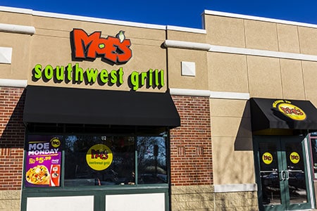 image - Moe's  Southwest Grill storefront showing red logo