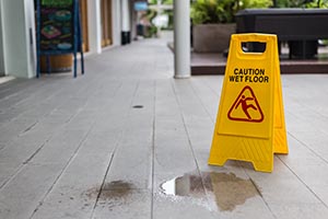 Yellow wet floor sign.