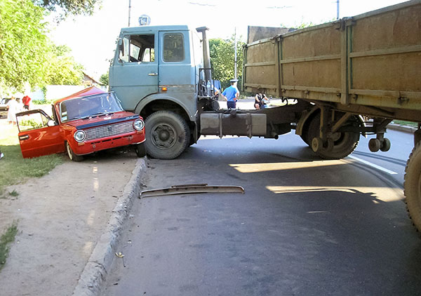 tractor trailer truck and car wreck